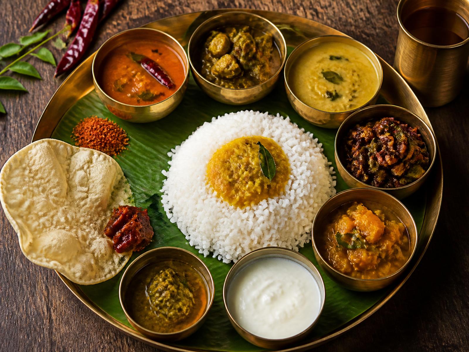 Authentic Andhra vegetarian thali with rice, dal, curries, pickle and curd